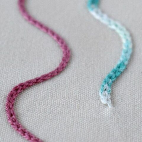 hungarian braided chain stitch embroidery with red and teal green floss1x1
